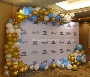 organic balloon garland setup